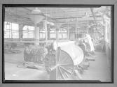 [Woman with Large Looms]