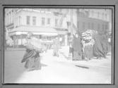Women Carrying Homework on Street