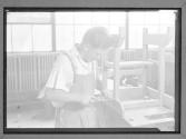 [Young Man Building Furniture]