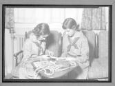 [Girl Scout sewing]