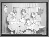 [Girl Scouts making marionettes]