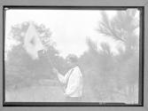[Woman with signal flag]