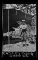 George B. Dryden with string of fish at campsite, Wyoming Trip