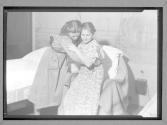 [Girl Scout helping woman]