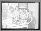 [Girl Scouts cooking]