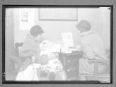 Woman and Children with Social worker