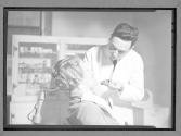 [Dentist and Patient]