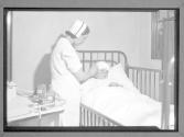 [Nurse with Patient]