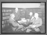 [Doctor and Others in Library]
