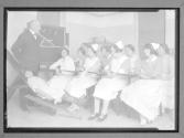 [Nursing Students with Child]