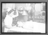 [Nurse X'Rays Patient]