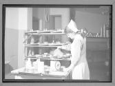 [Nurse Measures Meal]