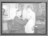 [Doctor with Patient]