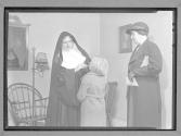 [Nun with Child]