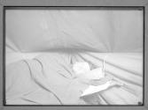[Soldier Asleep on Cot]