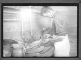 [Soldier Washes Dishes]