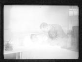 [Army Doctor with Patient]