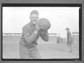 [Man with basketball]