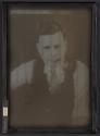 [Lenticular screen image, man with pipe]