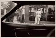 [Woman with jacket through car window, Japan]