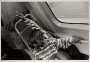 Paris Tramway, France (children sharing a seat)