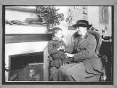 Woman Officer and Small Boy