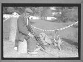 Tramp at Entrance to Chatteau near Paris
