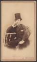 [Man wearing top hat]