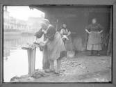 [Woman Washing Clothes]