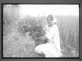Girl with Sheaf of Grass