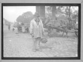 [Old Man in Street]