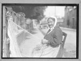 [Woman Mending Nets]