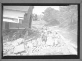 [Flood Victims by the River]