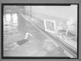 [Child Practicing Swimming Sroke]
