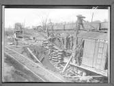 [Workers with Crane]