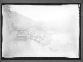 [Workers Moving Earth with Heavy Equipment]