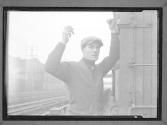[RR Worker next to Train]