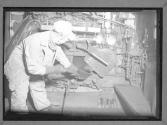 [RR Worker Shoveling Coal]