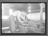 [Man Cleaning Press]