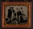 [Relaxed group of four women and two men]