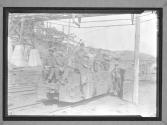 [Miners in Coal Car]
