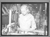 [Woman with Machine]