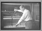 [Boy Tuning Piano]