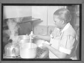 [Woman Cooking]