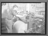 Man with Machine, Roll of Paper