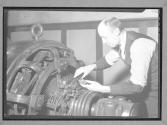 [Man with engine]
