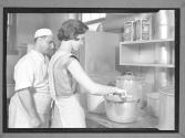 [Man and Woman Cooking]