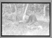 [Woman Showing Child Grass]