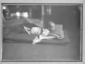 [Child on a Mattress, Floor]