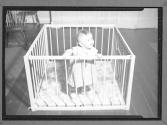 [Baby in Crib]